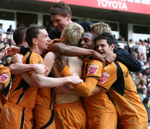 Wild celebrations as Wolves beat Derby 3-2 on their way to promotion