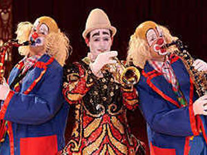 Supporting image for story: Clowns in trumpet playing ban