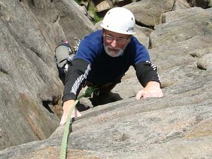 On top of the world – Pat mountain climbing on the Isle of Arran.