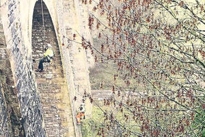 Supporting image for story: Abseiling antics as team cleans up Chirk Aqueduct