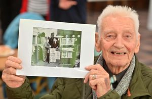 Eric Cox, 91, from Tipton. He finds himself here on a photo from the Lee Howell factory where he used to work. He would draw on his break time and had his own little art gallery at the factory. He's left on the pic alongside Kempy.
