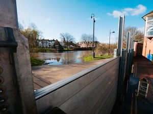 Supporting image for story: Shrewsbury car park closed and towpaths shut due to rising river levels