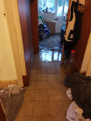 Towels down to block water entering rooms