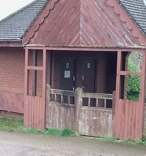 Locked toilets, weeds and rotten wood all evident at Powys cemetery