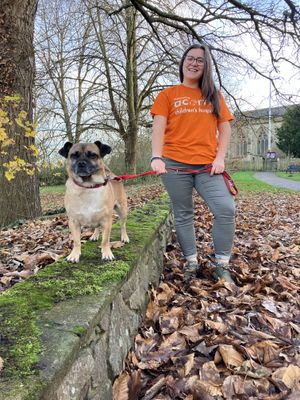 Sophie Boreham, Events Manager at Acorns, and her dog. 