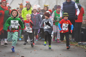 Youngsters raced off into the fog for the children's event.