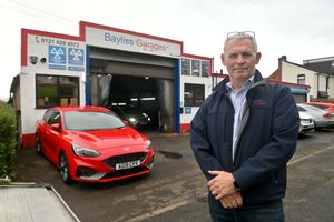 Bayliss Garages in Smethwick, which is celebrating its 65th anniversary. Pictured: Managing director Peter Bayliss