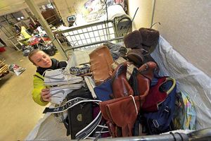 Iwona Stachura loading up goods at Cash 4 Clothes in Cannock