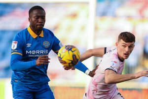 Daniel Udoh of Shrewsbury Town and Harrison Burrows of Peterborough United (AMA)