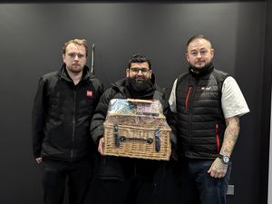 Supporting image for story: Walsall garage owner hailed a hero after swift actions saved delivery man