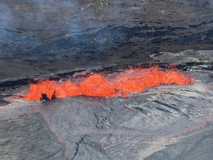 Supporting image for story: Watch: Lava overflows from the summit of a Hawaiian volcano