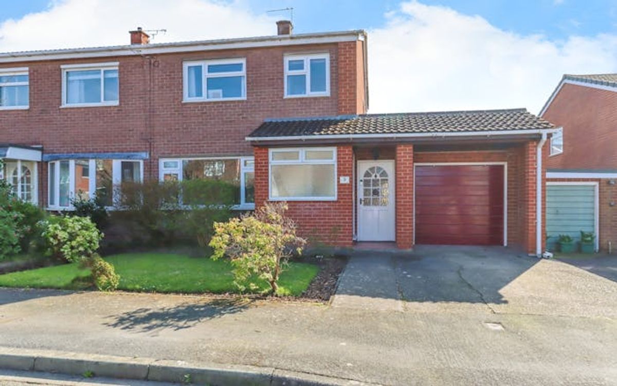 Spacious Shrewsbury semi with extended kitchen and tandem garage for £300k