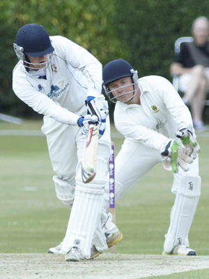 Steve Barnard knocks one to the outfield for Shrewsbury.