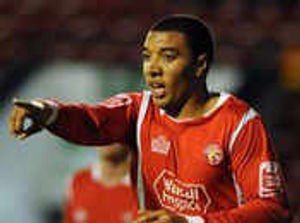 Troy Deeney's double salvo extended Walsall's unbeaten run to five games as they easily overcame 10-man Oldham at the Banks's.