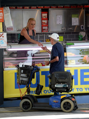 Butcher Katie Compton serving
