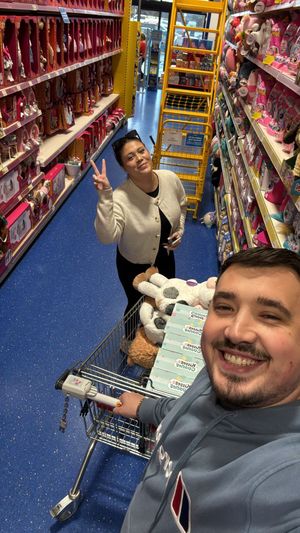 Pace Group's Jack Ford and Chloe Baird shopping for toys.
