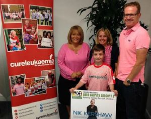 Ben Corfield, aged nine, with his mother Louise Corfield at Queen Elizabeth Hospital in Birmingham. Pictured right, James McLaughlin from Cure Leukaemia and left, Jackie Kelly from Cure Leukaemia