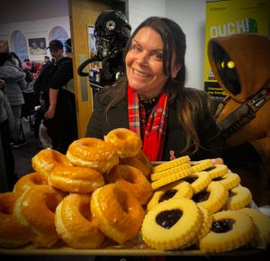 Councillor Leigh New (Lab, Bilston North) showcases some of the sweet treats donated by Greggs (Wolverhampton Mander Centre). 