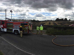 Supporting image for story: Roads closed after large field fire near Gobowen