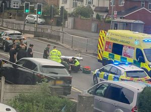 Police and paramedics on the scene after the crash. Photo: Shakira Sargent