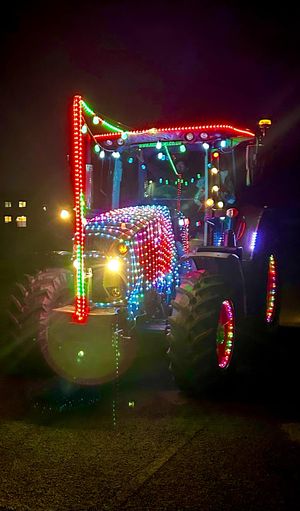 Carl Richards' prize-winning tractor covered in bright Christmas lights.