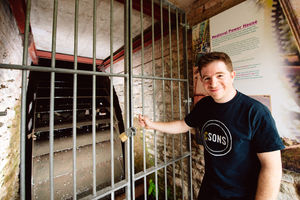 Josh Crouch with the waterwheel at Dinham Mill