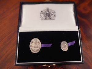 Supporting image for story: Family of 21-year-old paramedic who died in ambulance crash honoured by the King