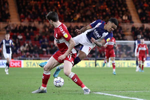 Paddy McNair of Middlesbrough fouls Grady Diangana of West Bromwich Albion during the Sky Bet Championship match between Middlesbrough and West Bromwich Albion at Riverside Stadium on February 22, 2022 in Middlesbrough, England. (Photo by Adam Fradgley/West Bromwich Albion FC via Getty Images).