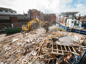 Supporting image for story: Old doctor's surgery reduced to rubble as Shrewsbury riverside demolition work gathers pace