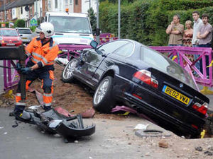 Supporting image for story: Car topples into ditch after crash