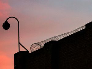 Supporting image for story: Two of four prisoners still at large were freed by mistake last year