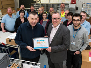 Supporting image for story: Oswestry hospital porter wins health award after 36 years' service