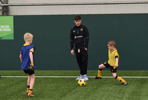 Luke Cundle with the youngsters. Photo: Dave Bagnall