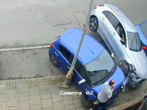 Supporting image for story: Watch: Lucky escape for Birmingham pedestrians after car smashes into parked vehicles