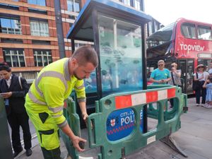 Supporting image for story: Barriers erected around Banksy’s new piranha artwork on London police box