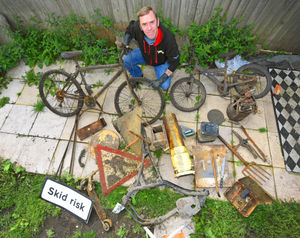 Scott Hargood with some of the items his family have retrieved from canals