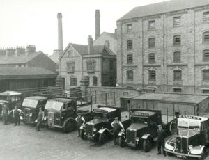 Some of the brewery's vehicles from early in the 20th century