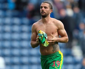 Jay Rodriguez prepares to fling his shirt into the crowd. (AMA)