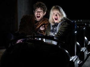 Supporting image for story: Energy gathered from screams on the new Walking Dead rollercoaster will be used to charge mobile phones