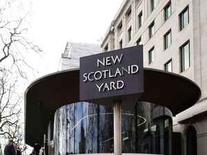 New Scotland Yard sign