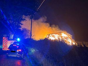 Supporting image for story: Dramatic image of late-night barn fire in village near Bridgnorth - multiple fire crews remain at scene