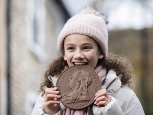 Supporting image for story: 200th banking hub opens with chocolate coins marking the event