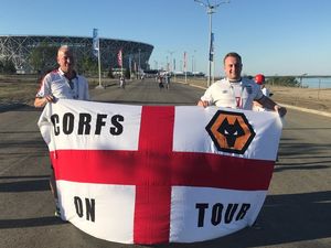 Supporting image for story: Wolves supporters whose flag was stolen in Russia get replacement