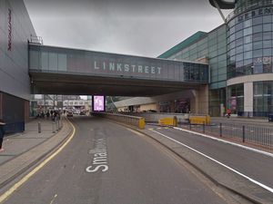 Supporting image for story: City centre road closed after man threatens to jump from bridge