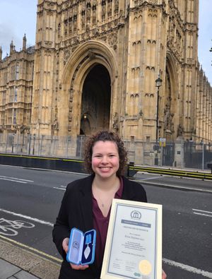 Keira Mayhew with her award