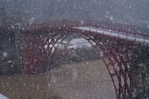 Snow falling in front of the Iron Bridge. Photo: Graham Hickman