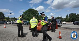 Police check over a car in Walsall this week