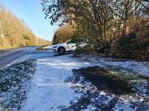 Supporting image for story: Cars struggle to stop as ungritted road left resembling ice rink