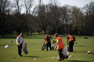 Council workers clean-up the mess left in Cannon Hill Park, Birmingham