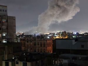 Smoke rising from a location reportedly struck by US airstrikes in Sanaa, Yemen